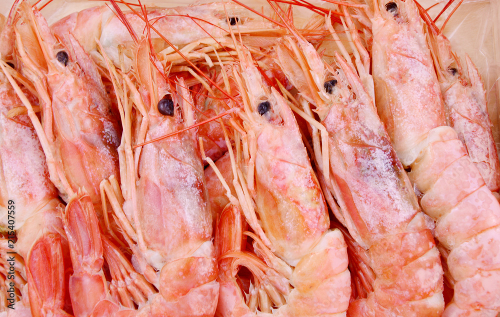 Frozen shrimps in wooden box.
Premium product in European supermarket.