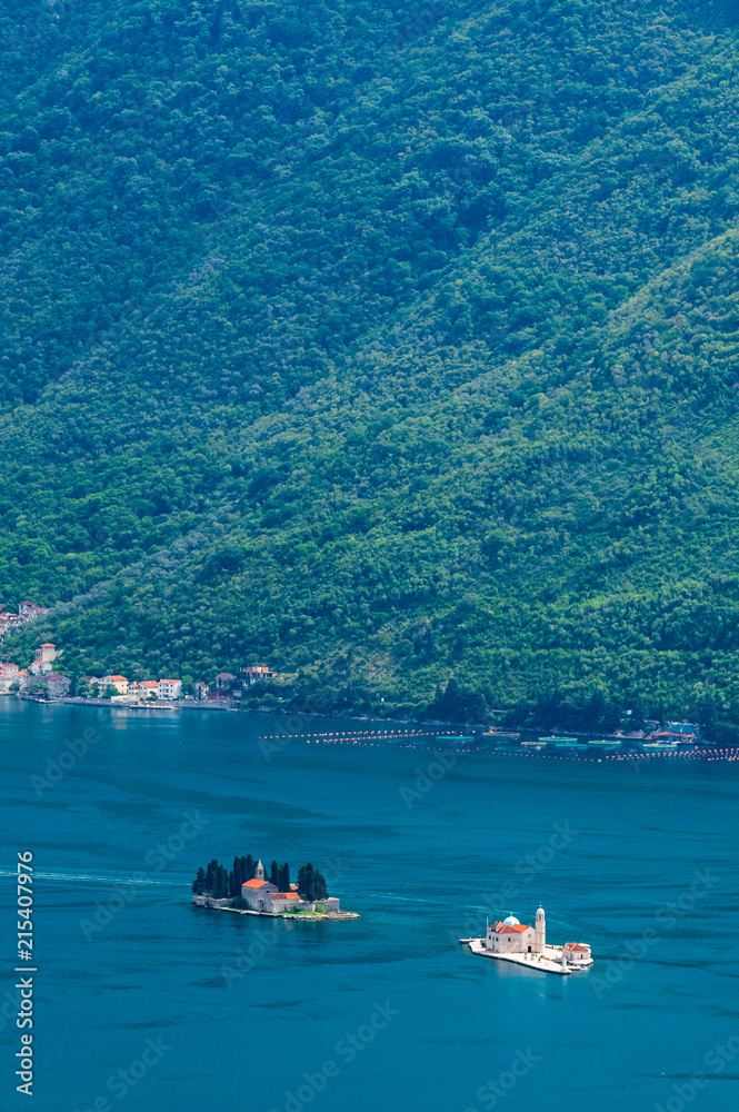 Fototapeta premium Famous Gospa-od-Shkrpjela from a bird's-eye view of the Boko-Kotor Bay in Montenegro