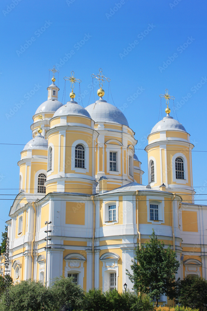 St. Vladimir's Cathedral Religious Landmark of Saint Petersburg, Russia. Neoclassical Architecture Building of Old Russian Orthodox Church on Summer Day View with Empty Blue Sky Background. 