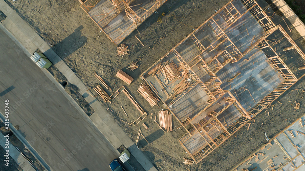 Fototapeta premium Drone Aerial View of Home Construction Site Foundations and Framing