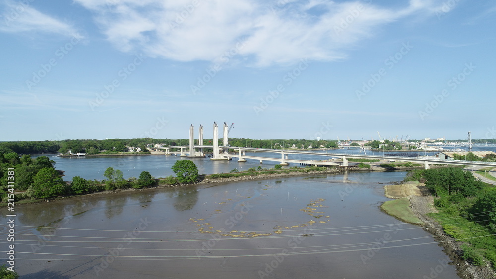 Aerial view of a white bridge in Portsmouth. Aerial view of a white bridge in Portsmouth.