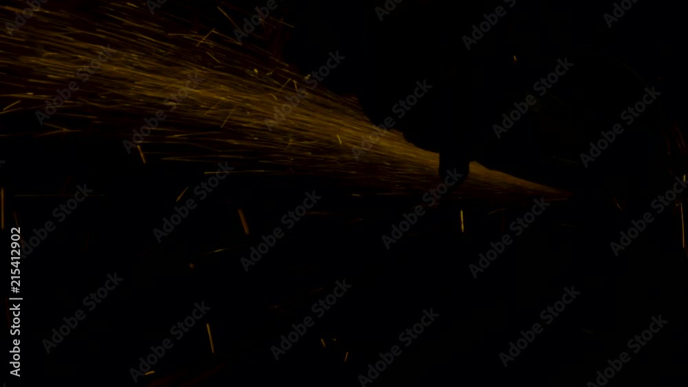 sparks effect - worker cutting iron