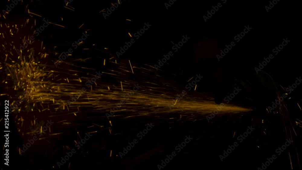 sparks effect - worker cutting iron