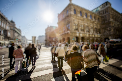 Fototapeta Naklejka Na Ścianę i Meble -  Crowd of anonymous people walking on busy city street