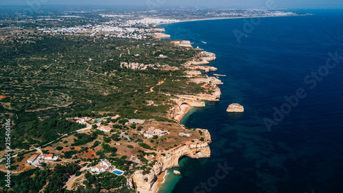 Fototapeta Naklejka Na Ścianę i Meble -  Above view of beautiful beaches of Algarve coastline in Portugal. Coastline from above.