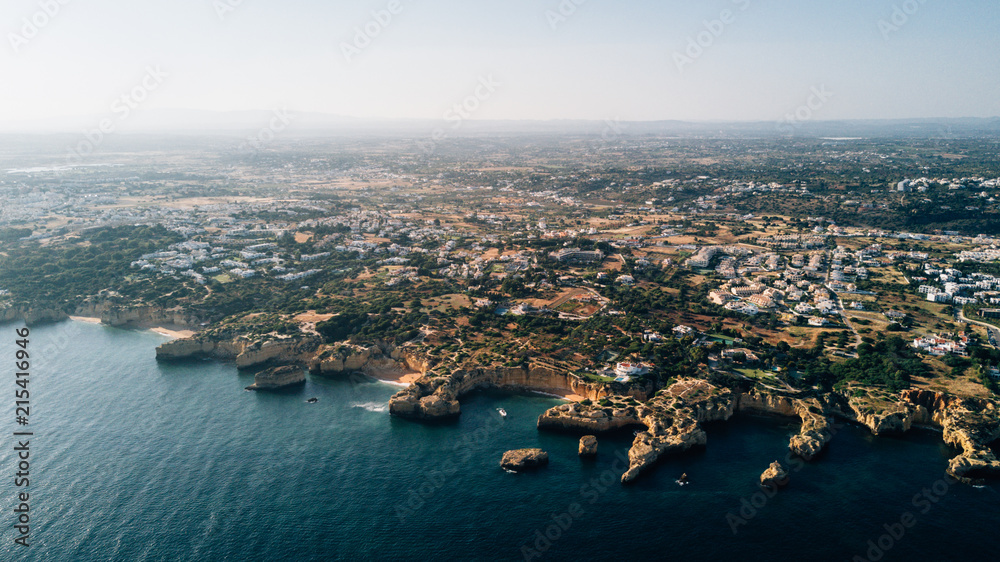 Algarve coast from above. Portugal coast aerial view. Ocean of above.