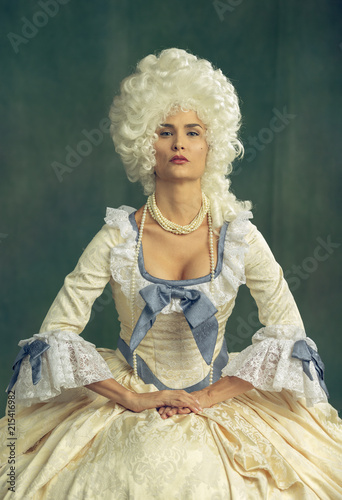 Marie Antoinette cosplay. Victorian dressed female model.