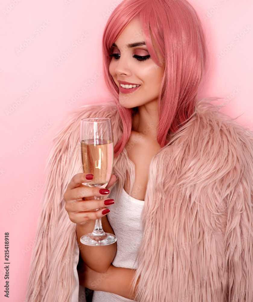 Young smiling woman holding glass with champagne Young smiling woman holding glass with champagne