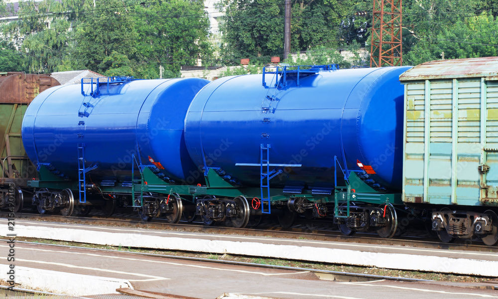 Naklejka premium Railway tanks. Copy space. Set of tanks with oil and fuel transport by rail. Gasoline tanker railroad
