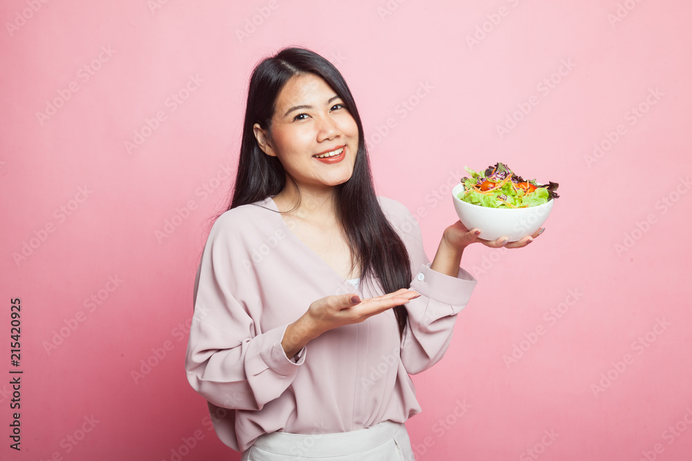 Healthy Asian woman with salad. Healthy Asian woman with salad.