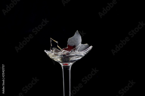 Broken glass in front of black background photographed under the name glass shards cocktail 