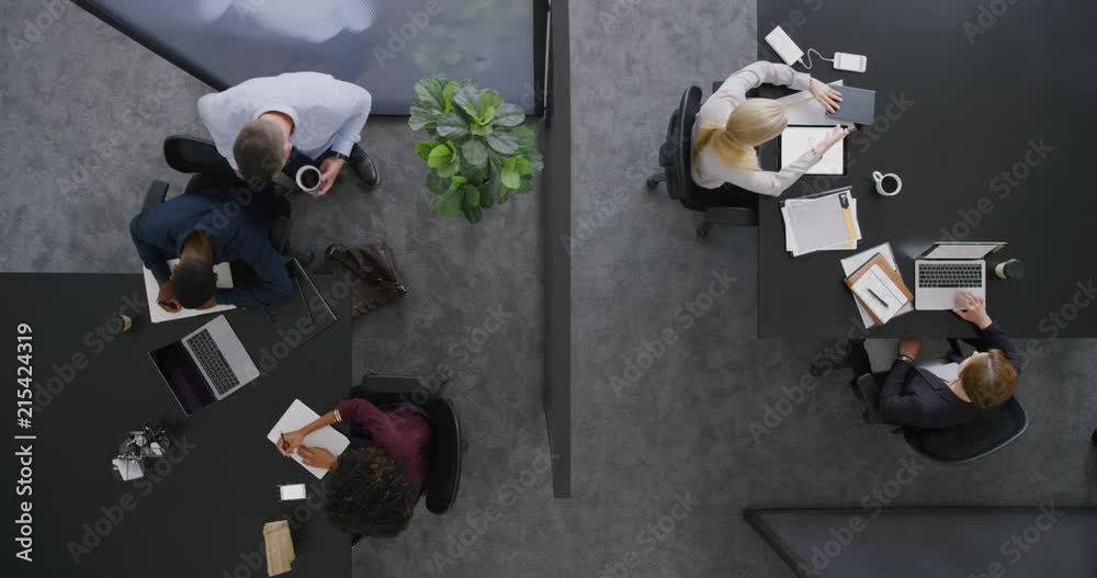 young multi ethnic business people working in office colleagues meeting discussing corporate strategy together sharing ideas top view professional career