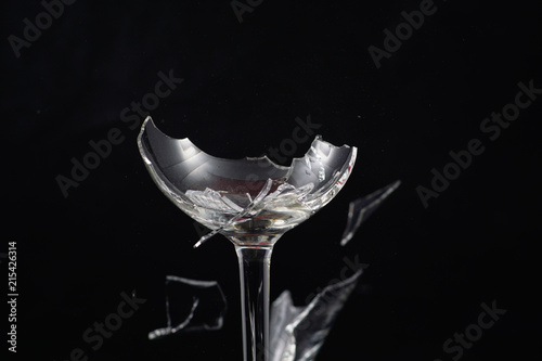 Broken glass in front of black background photographed under the name glass shards cocktail
