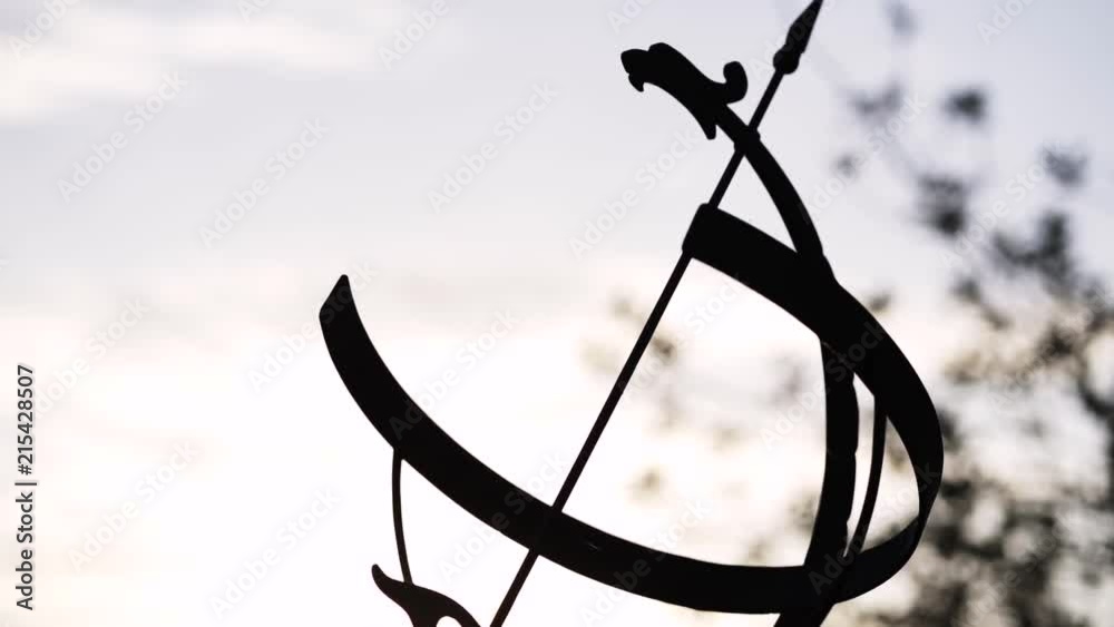 Sundial with the sun in the back. Sundial with the sun in the back.