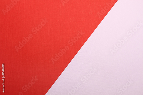 Red pink background from textured paper. Wallpaper