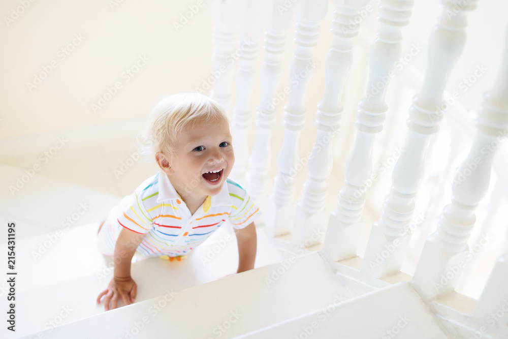 Kids on stairs. Child moving into new home. Kids on stairs. Child moving into new home.