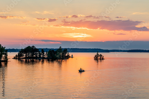 Fishing in summer evening, Finland