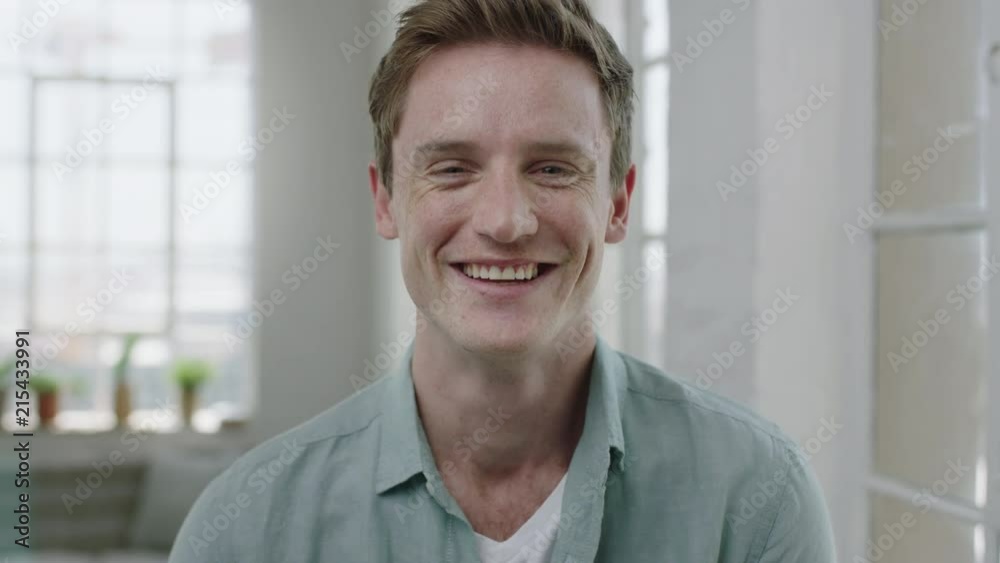 young handsome man portrait of red head guy laughing cheerful enjoying lifestyle change successful male in apartment background young handsome man portrait of red head guy laughing cheerful enjoying lifestyle change successful male in apartment background
