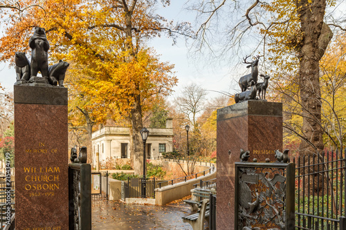 William Church Osborn Memorial Gates to Central Park, New York City in Autumn with Orange Yellow Tree leaves photo