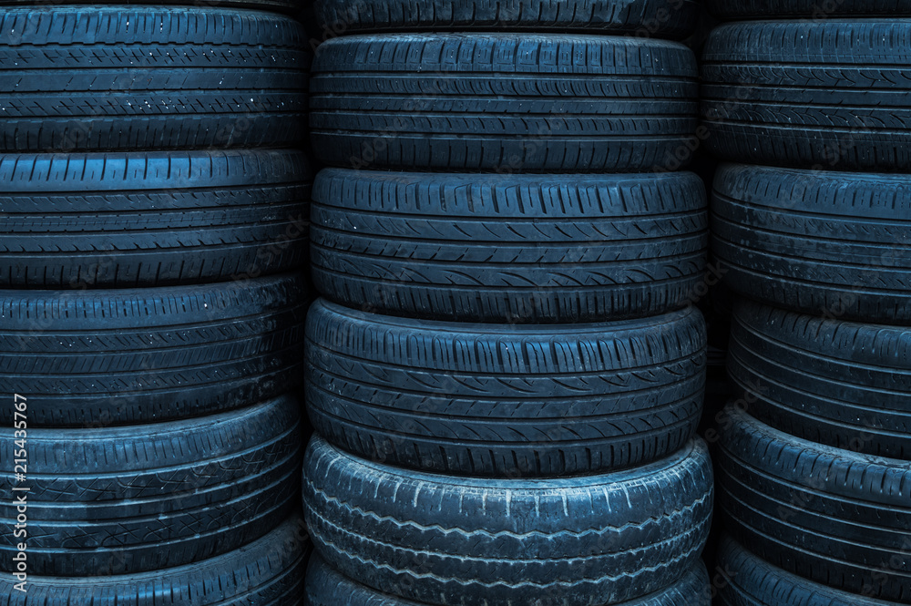 Stack of used tires. Dirty tires. Pile of tires. Black tire. Stack of used tires. Dirty tires. Pile of tires. Black tire.