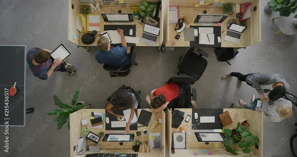 young diverse business people working in office multitasking employees networking developing creative ideas for successful startup company using technology above view