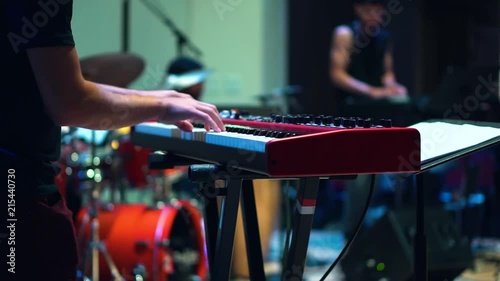 Electric keyboard in a band photo