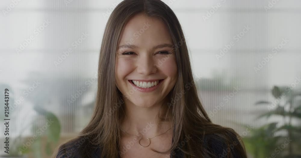portrait young happy business woman executive smiling enjoying successful career satisfaction professional female entrepreneur looking cheerful indoors office