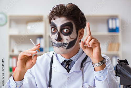 Scary monster doctor working in lab photo