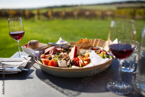 Gourmet platter at vineyard on Tasmania's north coast, Australia photo