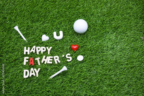 Happy Father's day to golfer word is on green grass