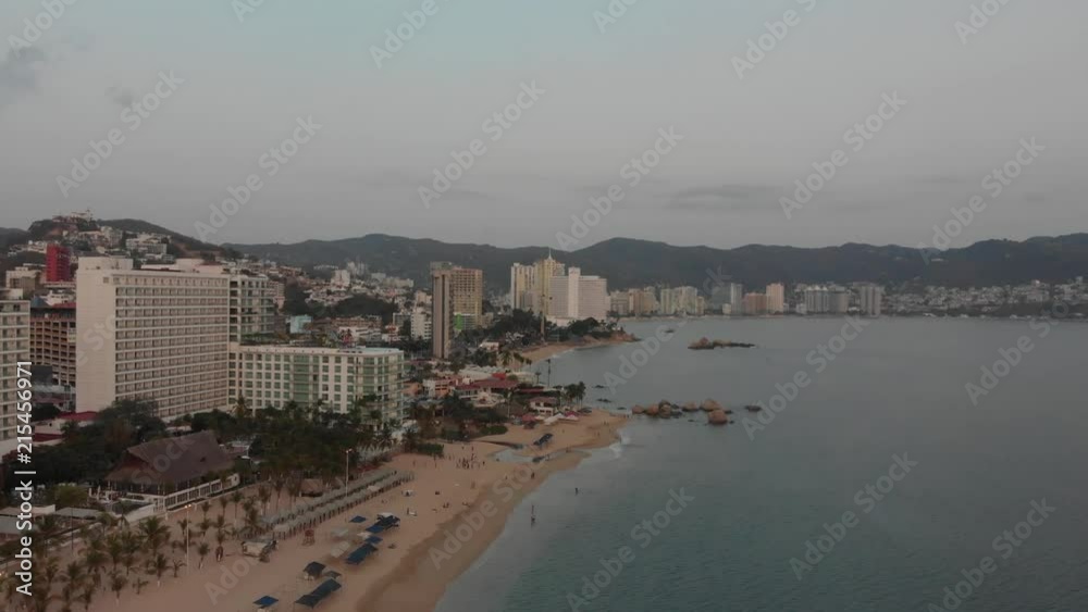 Aerial clip of Old Acapulco Beach during the sunset Aerial clip of Old Acapulco Beach during the sunset