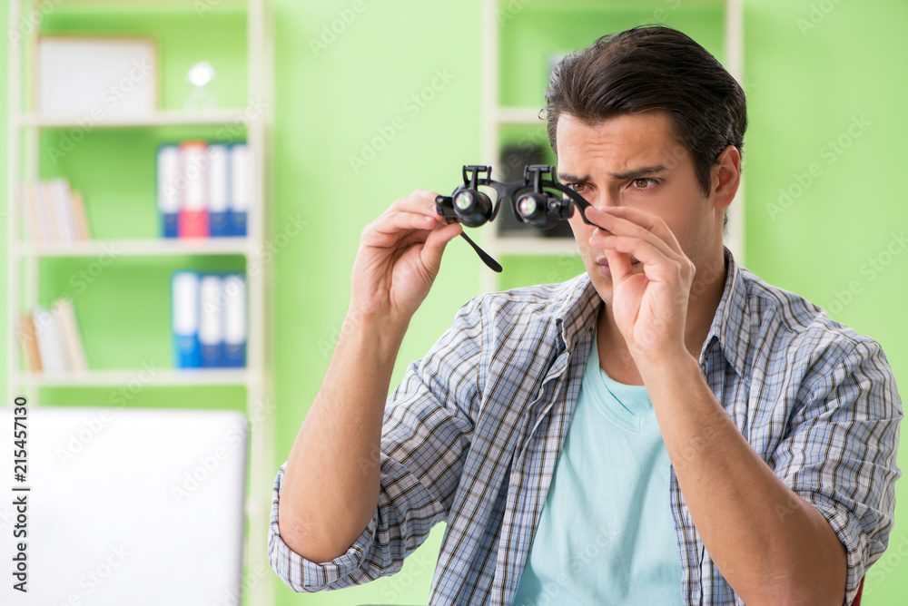 Fototapeta premium Computer engineer repairing broken desktop