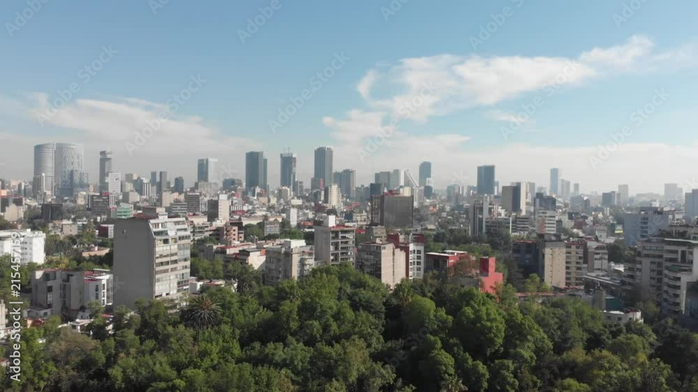 Aerial view of the Skyline in Mexico City, flying over Parque México in CDMX Aerial view of the Skyline in Mexico City, flying over Parque México in CDMX