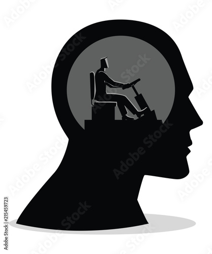 Human head being controlled by a businessman photo