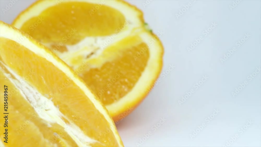 Orange Fruit in Half Focus in White Background. Closeup Orange Fruit in Half Focus in White Background. Closeup