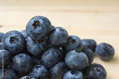 blueberry on wood table.Fresh organic blueberry.
