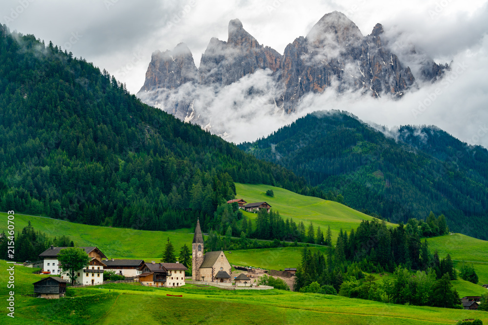 Beautiful landscape of Dolomites Italy with the Church of St. Magdalena Beautiful landscape of Dolomites Italy with the Church of St. Magdalena
