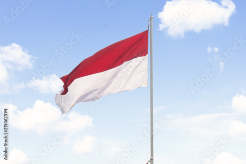 Indonesia flag with blue sky background