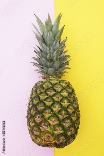 tropical summer fruit, pineapple on pink background