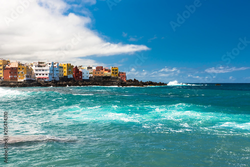 View of colourful houses of Punta Brava from beach Jardin in Puerto de la Cruz, Tenerife, Canary Islands, Spain photo