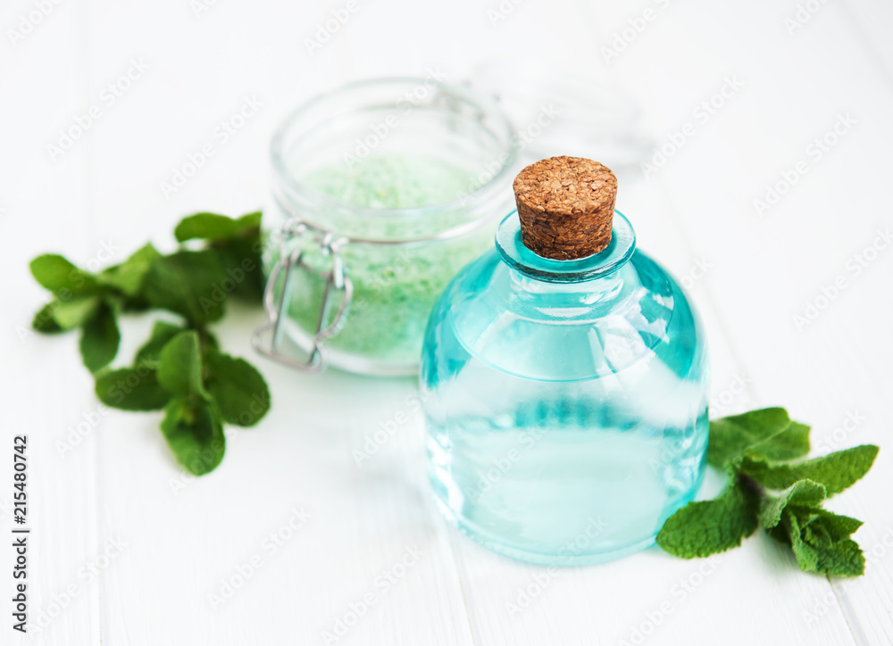essential aroma oil with massage salt and mint