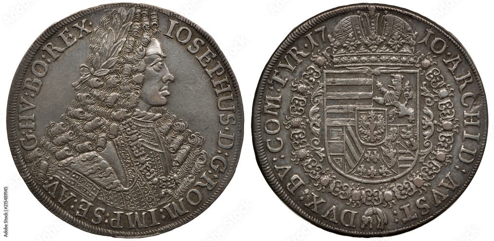 Fototapeta premium Holy Roman Empire of German Nation silver coin 1 one thaler 1710, bust of ruler Joseph I in rich clothes and laurel branches in wig, crowned shield with designs surrounded by order chain, 