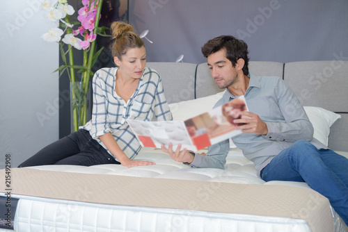 couple testing bed for possible purchase photo