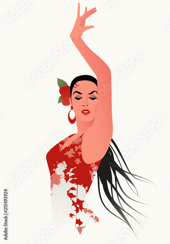 Beautiful Spanish flamenco dancer wearing flowery dress and flower in her hair