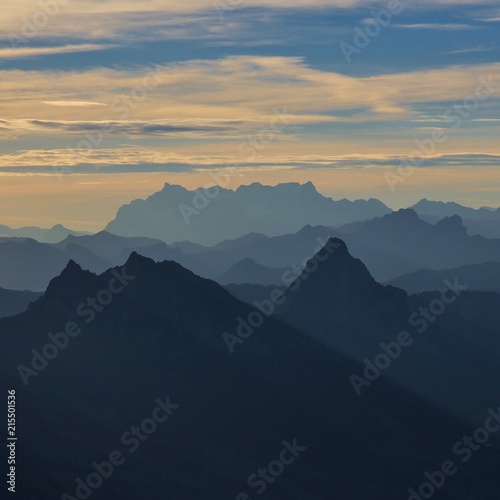 Morning scene in Switzerland. Silhouettes of Mount Grosser Mythen and other mountains of the Swiss Alps.