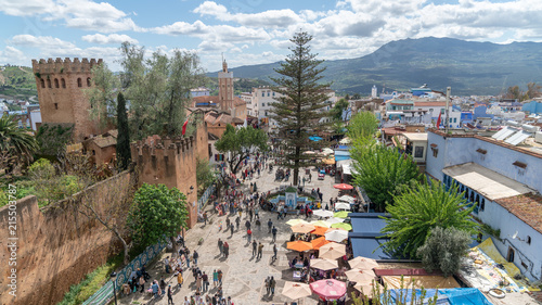 Chefchaouen medina center panaroma with unidentified people, blue city skyline on the hill, Morocco © CanYalicn