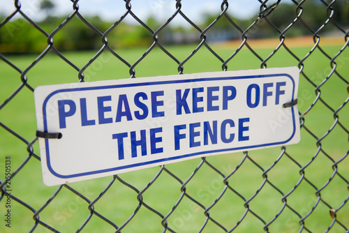 Please keep off the fence sign