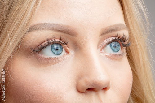 Obraz na plátně gorgeous attractive blond girl with magic blue eyes and long healthy hair