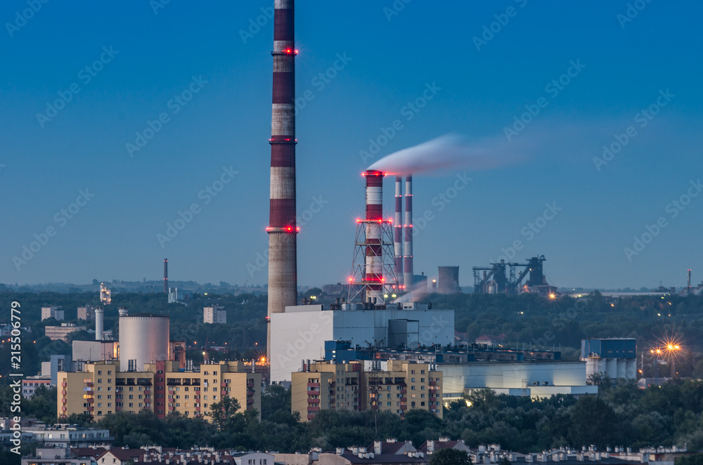 Power plant chimneys, evening Krakow, Poland