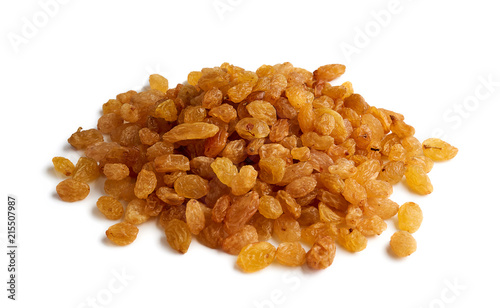 Heap of yellow raisins isolated on white background